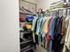 Organized closet with multiple levels of shelving and hanging space at 511 Van Deen Pl, The Villages, FL 34762