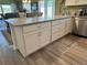 Kitchen island with custom cabinets and drawers at 511 Van Deen Pl, The Villages, FL 34762