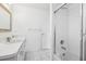 A well-lit bathroom with a vanity, toilet, and shower at 5332 Nw 20Th Pl, Ocala, FL 34482