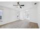 Bright bedroom featuring carpet, ceiling fan, and a window at 5332 Nw 20Th Pl, Ocala, FL 34482