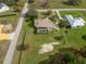 Charming home aerial view showcasing a screened pool, well-maintained lawn, and peaceful countryside setting at 6206 Ocilla Loop, Clermont, FL 34714