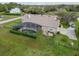 Home's outdoor living, features a screened pool area with privacy hedges for relaxation and entertaining at 6206 Ocilla Loop, Clermont, FL 34714