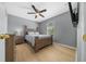 Inviting bedroom with wooden furniture, creating a cozy and comfortable space at 906 Calabria Ave, Davenport, FL 33897