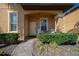 Inviting front porch with comfortable seating and manicured landscaping, offering a welcoming entrance at 906 Calabria Ave, Davenport, FL 33897