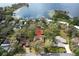 Aerial view of the property showing proximity to a lake and surrounding neighborhood at 925 Northside Dr, Mount Dora, FL 32757