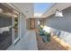 Hallway with modern doors and potted plants at 925 Northside Dr, Mount Dora, FL 32757