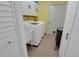 Functional laundry room features a sink, washer, and dryer at 925 Northside Dr, Mount Dora, FL 32757