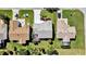 Bird's eye view of a home and neighborhood featuring meticulous landscaping and a relaxing screened-in patio at 9511 Se 168Th Elderberry Pl, The Villages, FL 32162