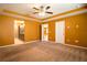 Spacious main bedroom with neutral carpet at 1041 Bradford Ridge Dr, Leesburg, FL 34748