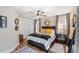 Stylish bedroom with hardwood floors, ample closet space, and decorative accents at 12117 Cypress Ln, Clermont, FL 34711