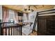 Charming bedroom with vaulted wood ceiling, bunk beds, and natural light at 12117 Cypress Ln, Clermont, FL 34711