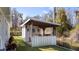 Outdoor kitchen with bar-top and built-in grill, perfect for entertaining guests at 12117 Cypress Ln, Clermont, FL 34711