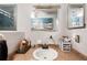 Cozy bathroom featuring a vanity with ample counter space, neutral tones and a ceiling fan at 132 E Belt Ave, Bushnell, FL 33513