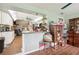 View of the kitchen, open to the living room at 132 E Belt Ave, Bushnell, FL 33513