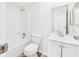 Bright bathroom with a toilet, a tub and shower combination, and a vanity with plenty of storage at 13877 County Road 109F, Lady Lake, FL 32159