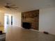 Open living area with modern wood accent wall and ample natural light at 1408 Diamond Loop Dr, Kissimmee, FL 34744