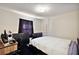 Bedroom featuring a desk and white bedding at 151 Shiloh Ave, Lady Lake, FL 32159