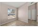 Bedroom with tile floors and natural lighting at 15318 Margaux Dr, Clermont, FL 34714