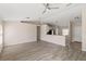 Bright and airy living room showcasing a breakfast bar that connects to the kitchen at 15318 Margaux Dr, Clermont, FL 34714