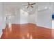 Bright living room featuring wood floors, white walls, and recessed lighting at 16839 Rockwell Heights Ln, Clermont, FL 34711