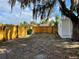 Large backyard with a new wooden fence, offering privacy and space at 1700 Hollywood Ave, Eustis, FL 32726