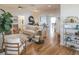 Bright and airy living room with hardwood floors and comfortable seating at 1828 Augustine Dr, The Villages, FL 32159