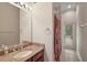 Bathroom featuring single vanity and granite countertops at 2031 Capri Ln, Mount Dora, FL 32757