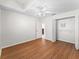 Bedroom with laminate floors, ceiling fan, and closet at 2039 Palo Alto Ave, The Villages, FL 32159