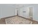 Spacious bedroom offering hardwood floors and ensuite bathroom at 2058 Thornton Ter, The Villages, FL 32162