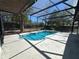 Enclosed pool with screen enclosure and spacious deck at 2309 Fairview Ct, Eustis, FL 32726