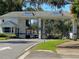 Gated entrance with 'Visitors' and 'Residents' lanes offering community security and controlled access at 25517 Laurel Valley Rd, Leesburg, FL 34748