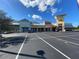 Modern medical office building featuring a light color palette and ample parking at 25517 Laurel Valley Rd, Leesburg, FL 34748