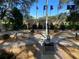 Veteran's memorial site with flags and a memorial wall dedicated to those who served our country at 25517 Laurel Valley Rd, Leesburg, FL 34748