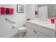 Bright bathroom featuring a white vanity, modern fixtures, and decorative towels at 26694 Otter Creek Ln, Leesburg, FL 34748