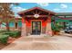 Exterior shot of the Lexington Spa entrance, featuring stone pillars and a covered entryway at 26821 Augusta Springs Cir, Leesburg, FL 34748