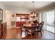 A spacious dining area seamlessly connects to the kitchen and offers access to the patio at 3076 Gulfport Ct, The Villages, FL 32163