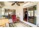 Cozy Florida room with indoor-outdoor feel from the large sliding doors at 3076 Gulfport Ct, The Villages, FL 32163