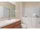 Bathroom features a sink and a walk-in tub with safety features for easy access at 3201 Sonesta Ct # B, Clermont, FL 34711