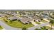 Aerial view of a residential neighborhood featuring single-Gathering homes with mature landscaping and neighborhood streets at 3403 Rabbit Run Path, The Villages, FL 32163