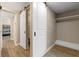 Hallway features a closet with barn doors and light-toned walls at 36014 Poinsettia Ave, Fruitland Park, FL 34731