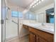 Bathroom featuring a shower and vanity with white countertop at 3725 Westerham Dr, Clermont, FL 34711