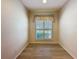 A room with hardwood floors and natural light at 3725 Westerham Dr, Clermont, FL 34711