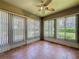 Bright sun room with tile floors, vertical blinds, and plenty of natural light at 3725 Westerham Dr, Clermont, FL 34711