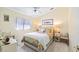 Bright, well-lit bedroom with a comfortable bed and plush rug at 3773 Eversholt St, Clermont, FL 34711