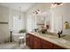 Bright bathroom with double vanity, soaking tub, and modern fixtures at 5029 Greenbriar Trl, Mount Dora, FL 32757