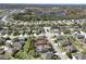 Aerial view of home and surrounding neighborhood. The lot line is marked in red at 5262 Royce Dr, Mount Dora, FL 32757