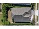 Aerial view of home showcasing roof and landscaping at 569 Bellflower Way, Clermont, FL 34715