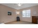 Spare bedroom with a closet, chair and bright window at 5824 Blue Savannah Dr, Leesburg, FL 34748