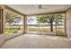 Enclosed back patio with views of the lake at 5824 Blue Savannah Dr, Leesburg, FL 34748