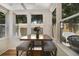 Sunroom dining area with bench seating and lots of light with a view of the outdoor patio at 630 E 8Th Ave, Mount Dora, FL 32757